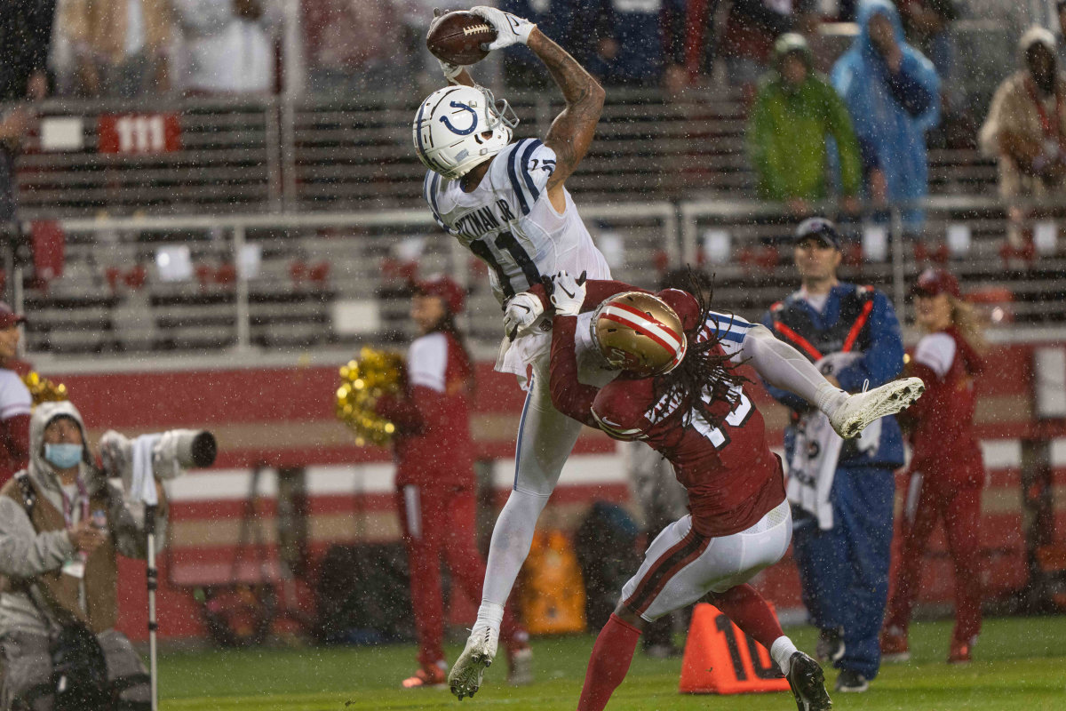 Oct 24, 2021; Santa Clara, California, USA; San Francisco 49ers cornerback Dre Kirkpatrick (13) attempts to defend against Indianapolis Colts wide receiver Michael Pittman (11) during the fourth quarter at Levi's Stadium. Mandatory Credit: Stan Szeto-USA TODAY Sports